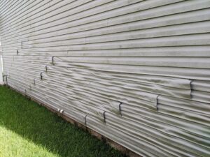 THE 90 DEGREE PLUS DAYS OF SUMMER – WHAT IS IT DOING TO YOUR VINYL SIDING OR CEMENT BOARD? HOW ABOUT THAT CHIPPING OR PEELING PAINT?